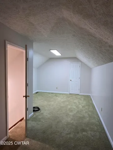 a view of a room with an empty space