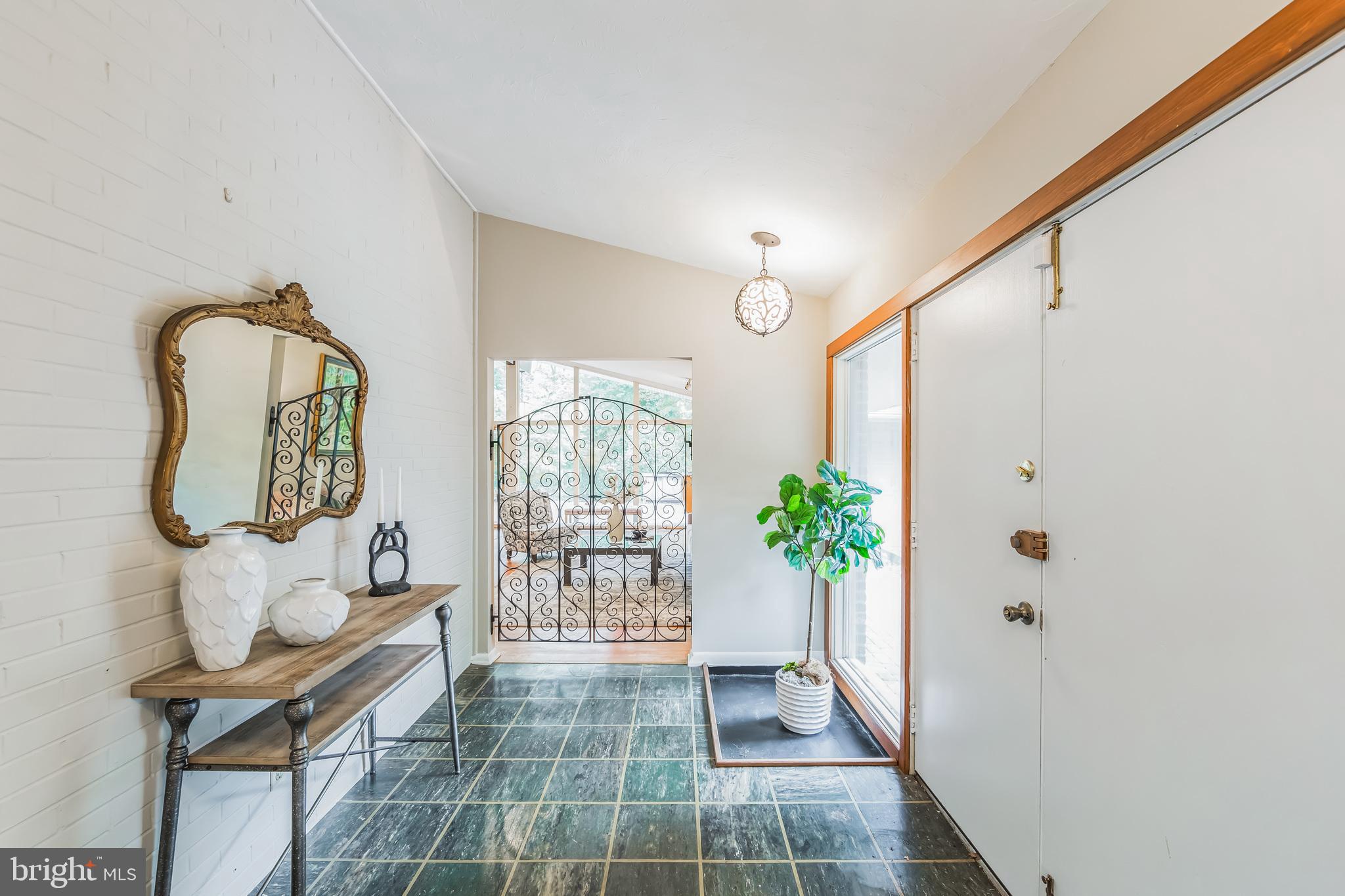 603 Thomas Road Downingtown, PA 19335 - Photo 4 of 36 Foyer with stunning wrought iron gate