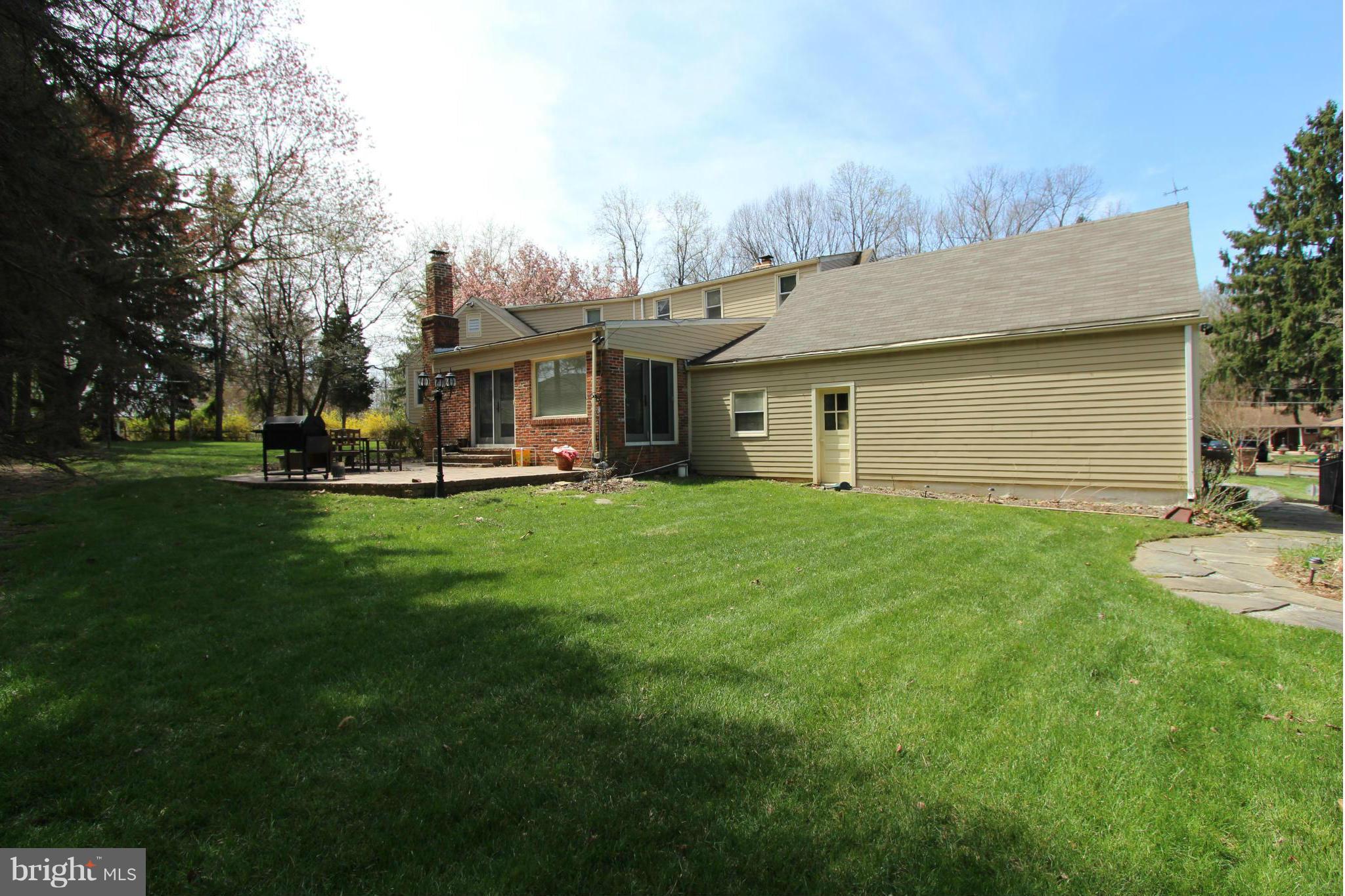 8720 Windsor Mill Road Baltimore, MD 21244 - Photo 2 of 27 a front view of house with yard and green space