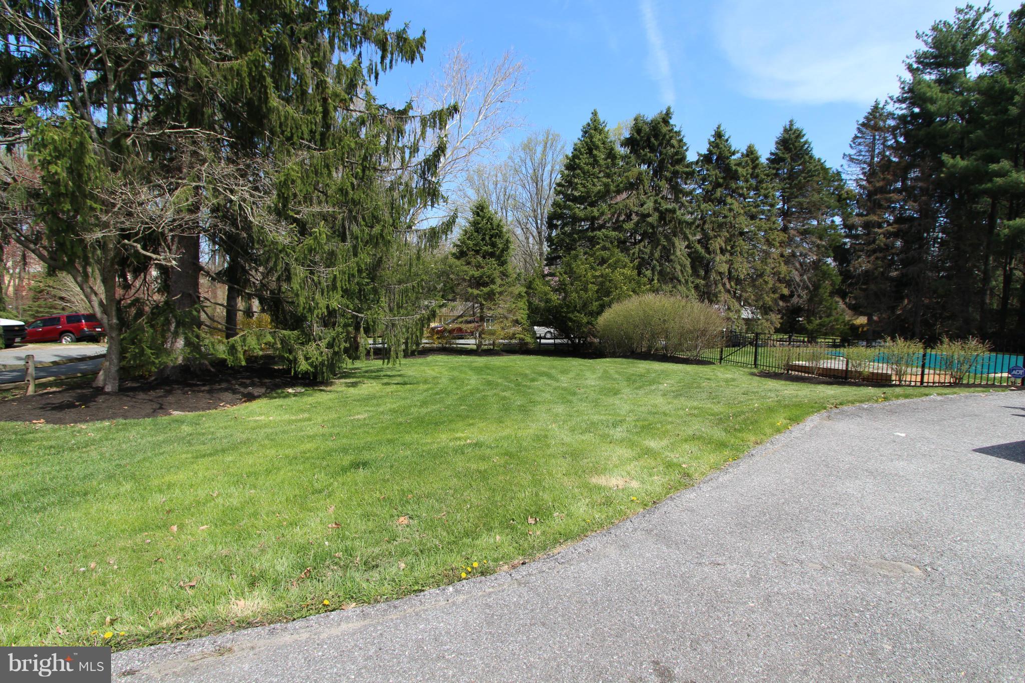 8720 Windsor Mill Road Baltimore, MD 21244 - Photo 3 of 27 a view of a park with large trees