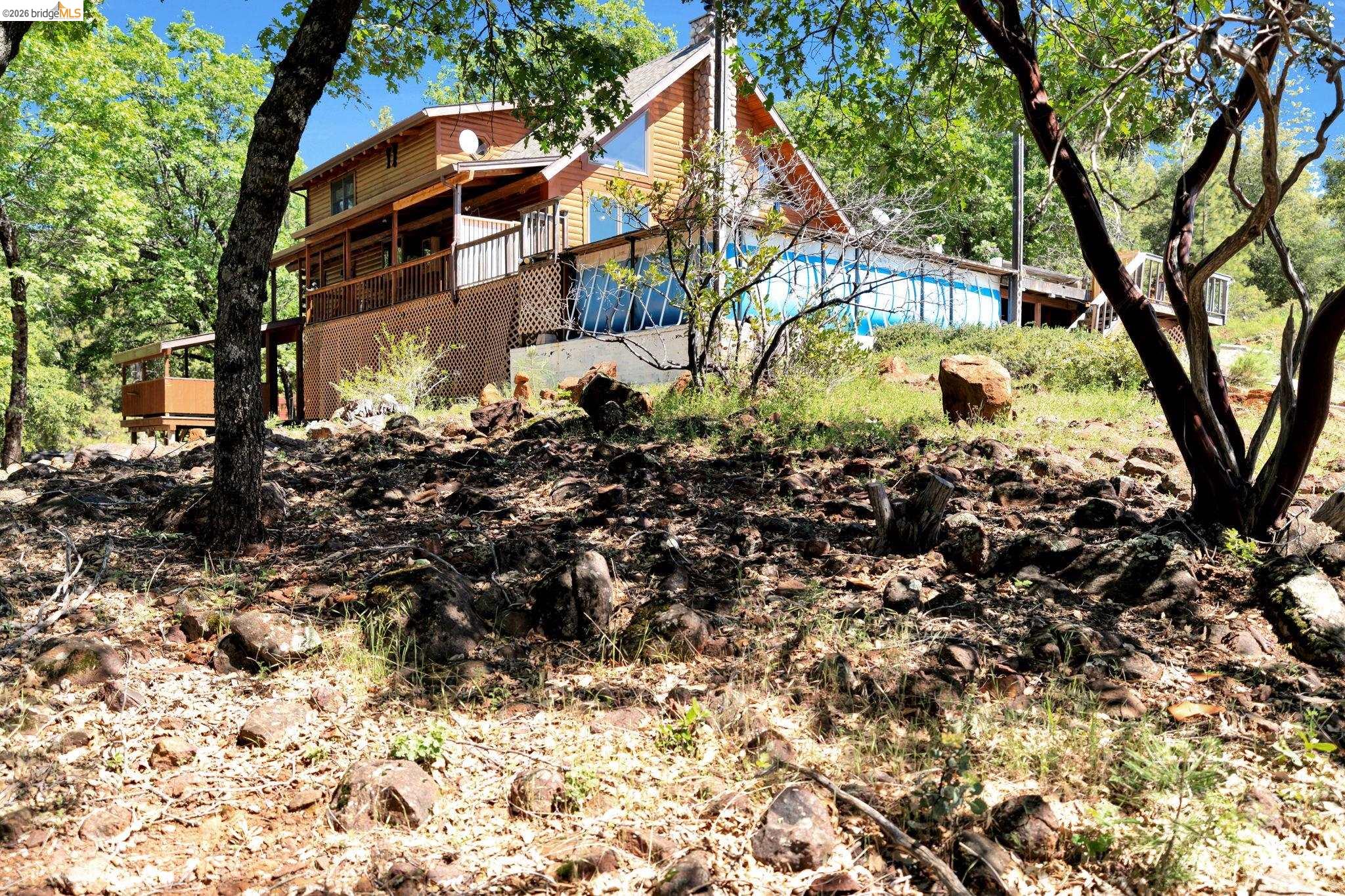 14799 Big Hill Road Sonora, CA 95370 - Photo 40 of 60 Back of house with a wooden deck