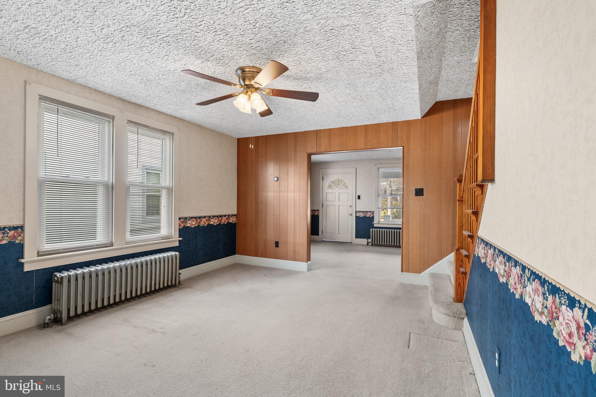 29 South 6th Street Quakertown, PA 18951 - Photo 15 of 51 a view of an empty room with a window and a chandelier fan
