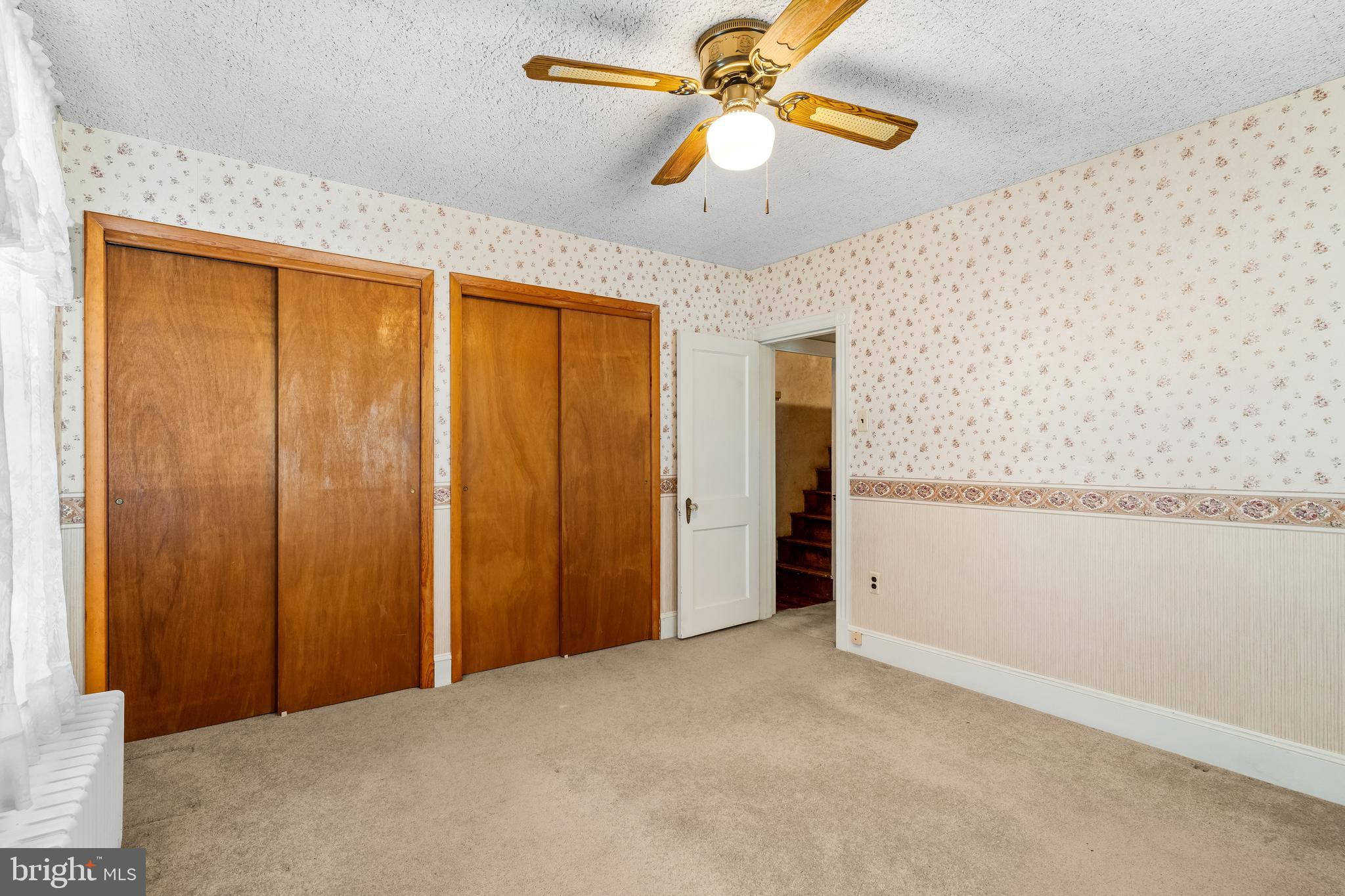 29 South 6th Street Quakertown, PA 18951 - Photo 28 of 51 a view of a hallway with a chandelier fan
