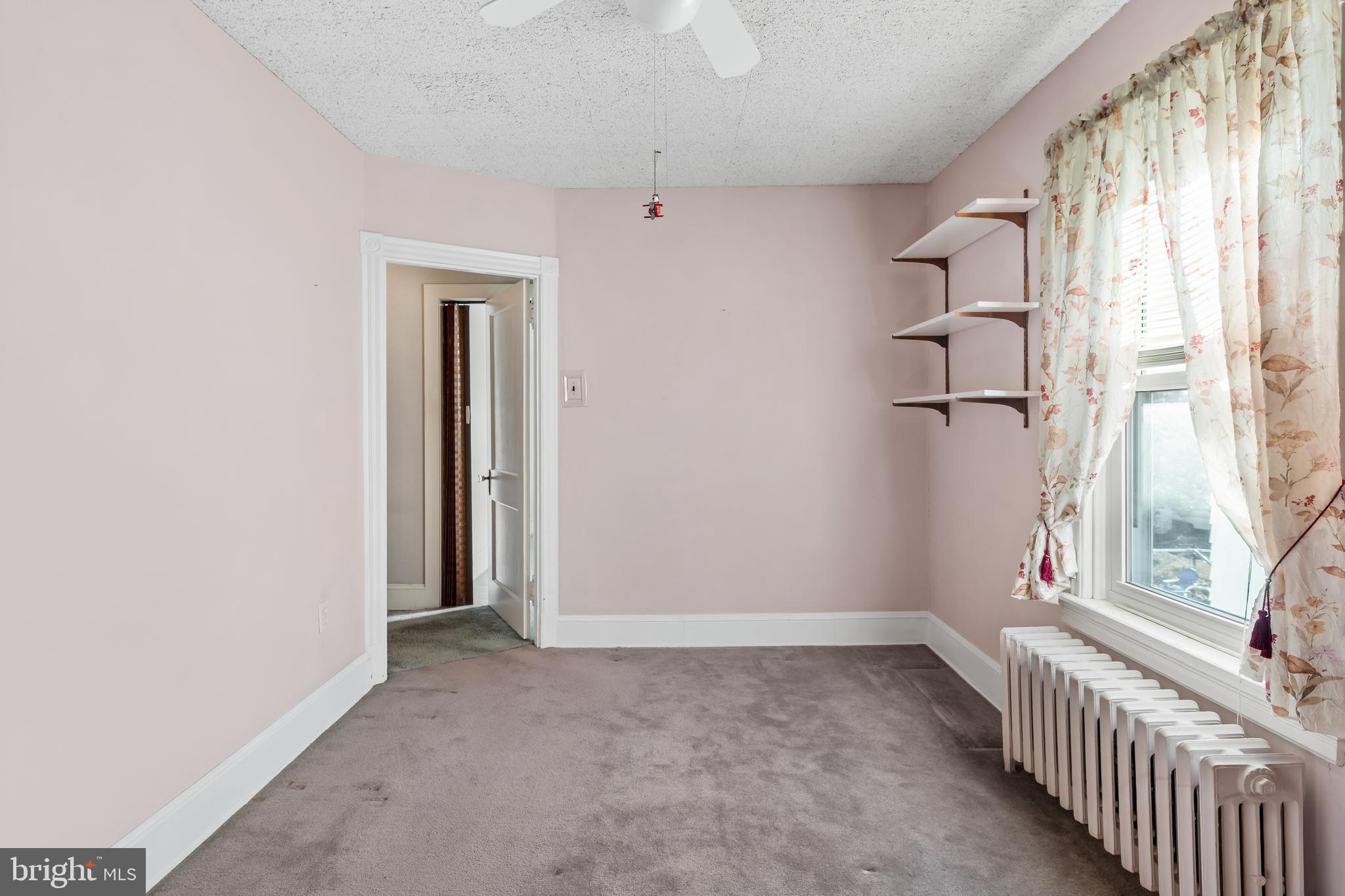 29 South 6th Street Quakertown, PA 18951 - Photo 29 of 51 a view of an empty room with a window