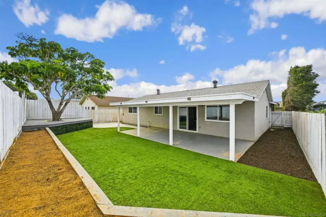 a view of a backyard with a garden