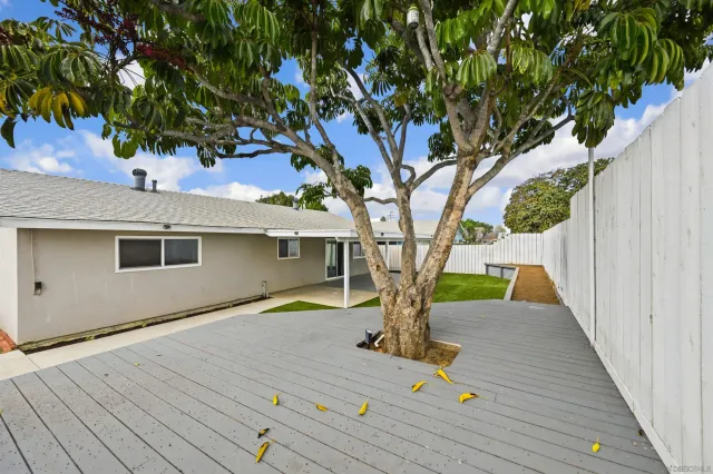 a view of a backyard of the house