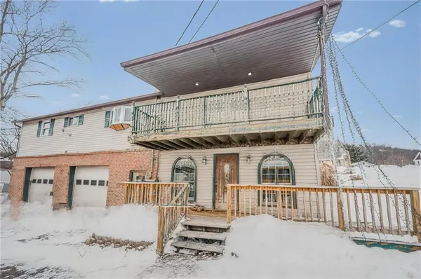 a view of a house with a balcony