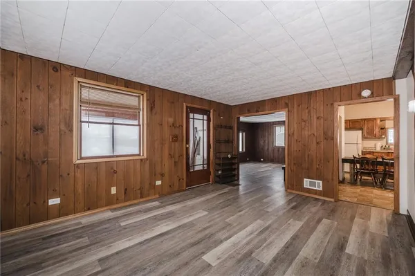 a view of a livingroom with wooden floor
