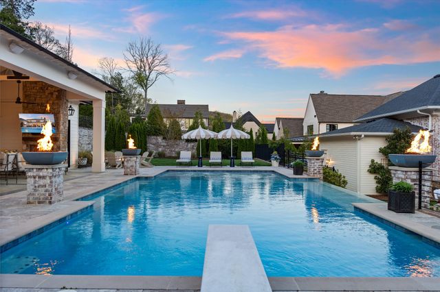 front view of a house with a garden