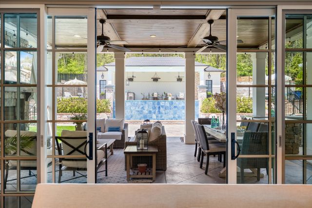 a front view of house with yard and seating area