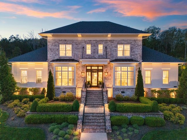 an aerial view of a house with a garden