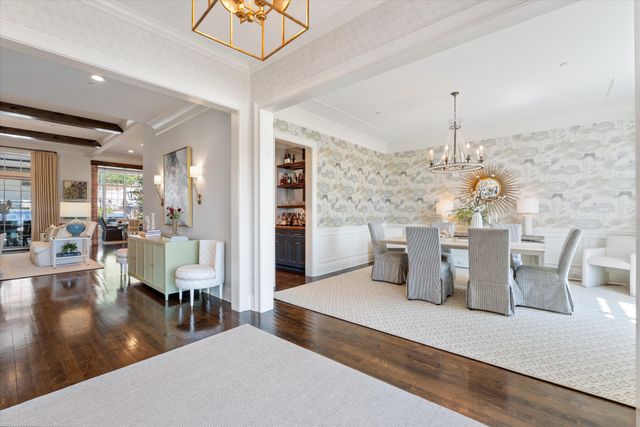 a view of a swimming pool with a yard