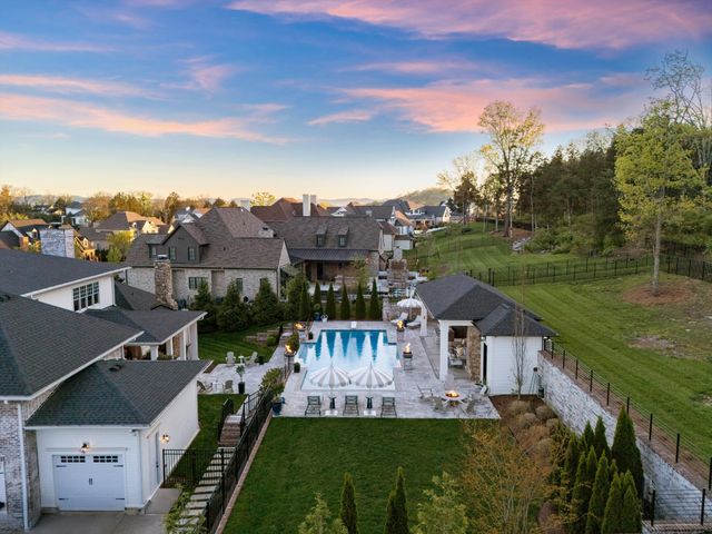 a view of a dining room with furniture and window