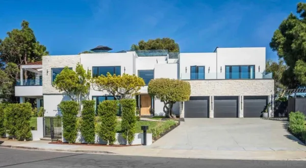 front view of a house with a yard