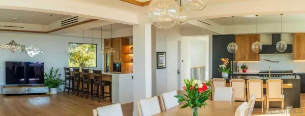 a lobby with furniture and potted plant