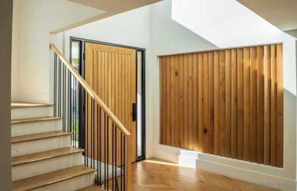 a view of entryway with wooden floor and door