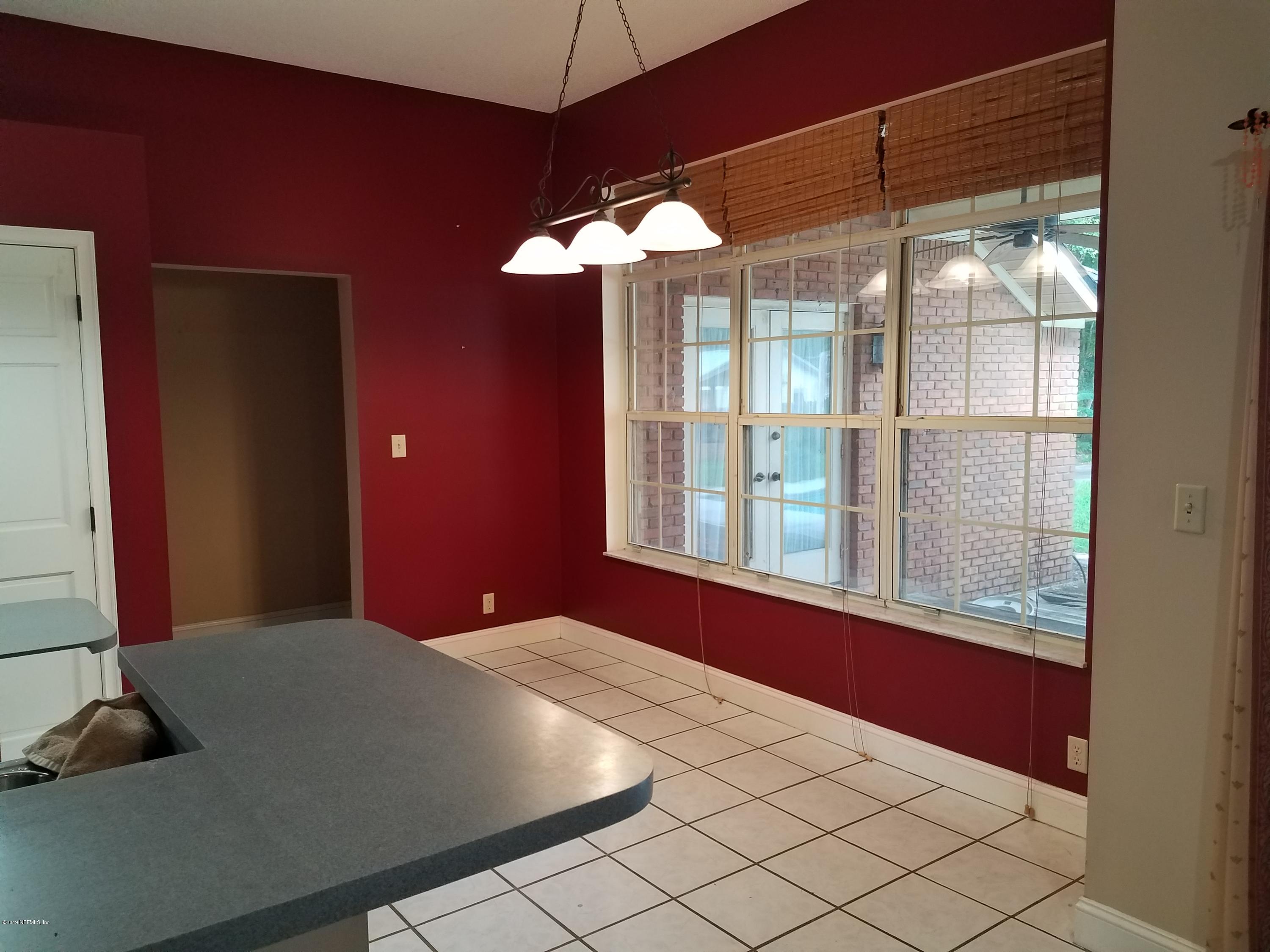 2970 Cortez Road Jacksonville, FL 32246 - Photo 11 of 12 a bedroom with a bed and a window