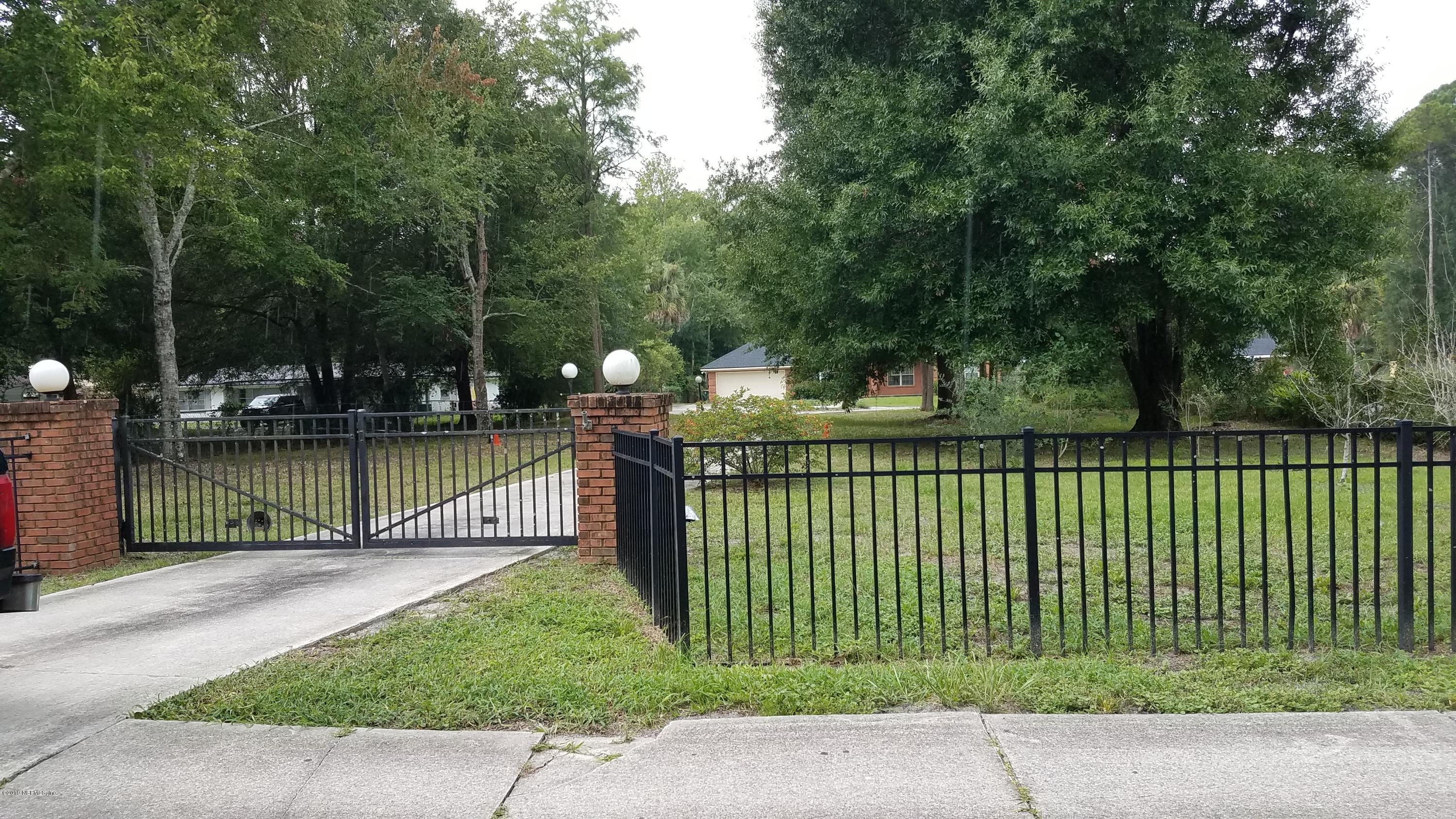 2970 Cortez Road Jacksonville, FL 32246 - Photo 2 of 12 a view of a wrought iron fences in front of house