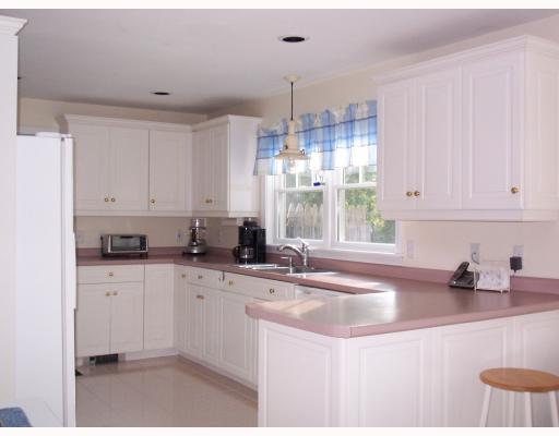 14 Congress Road Narragansett, RI 02882 - Photo 6 of 8 Kitchen. Kitchen has tile. Refrigerator and Range 1 year old.