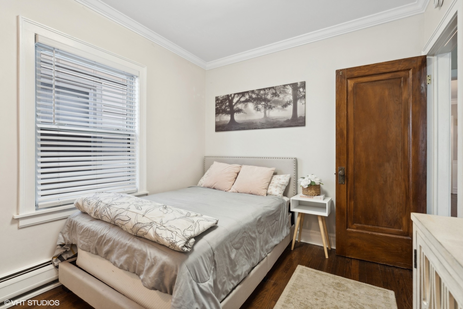 2819 North Rutherford Avenue Chicago, IL 60634 - Photo 18 of 28 a bedroom with a bed and a window