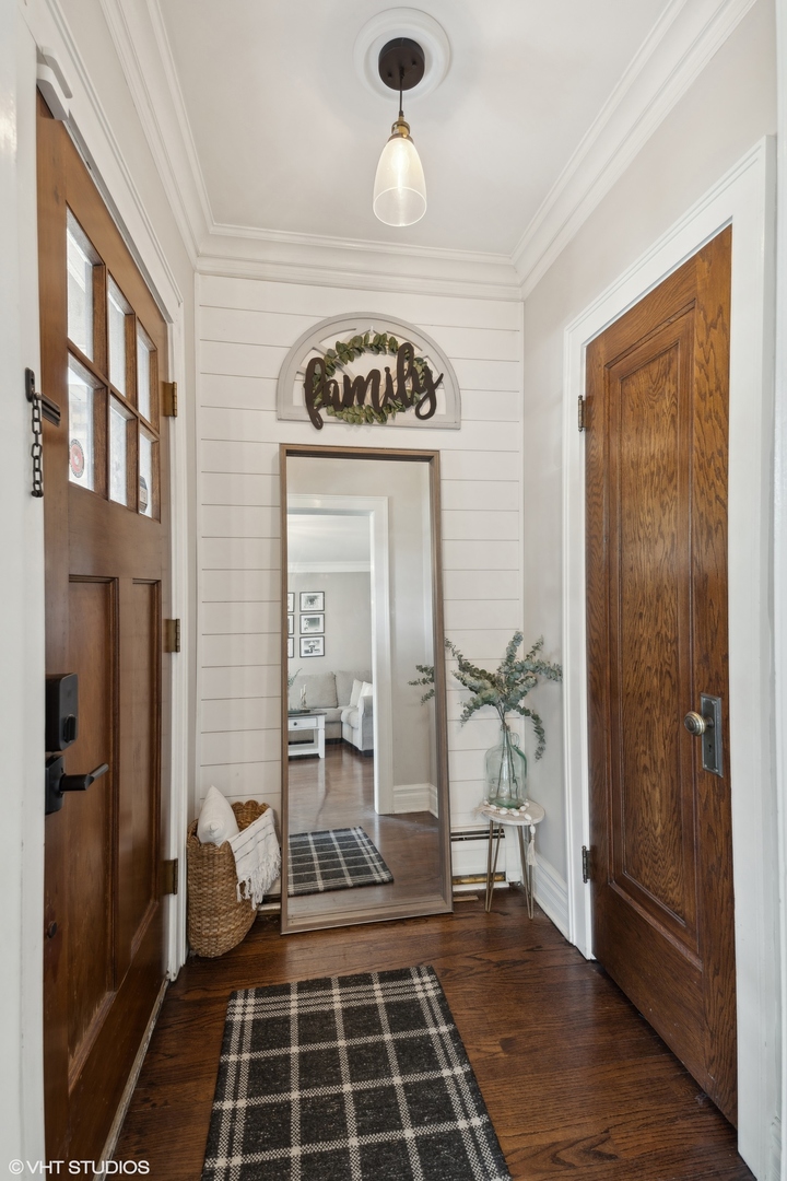 2819 North Rutherford Avenue Chicago, IL 60634 - Photo 2 of 28 a view of a hallway with a door and a living room