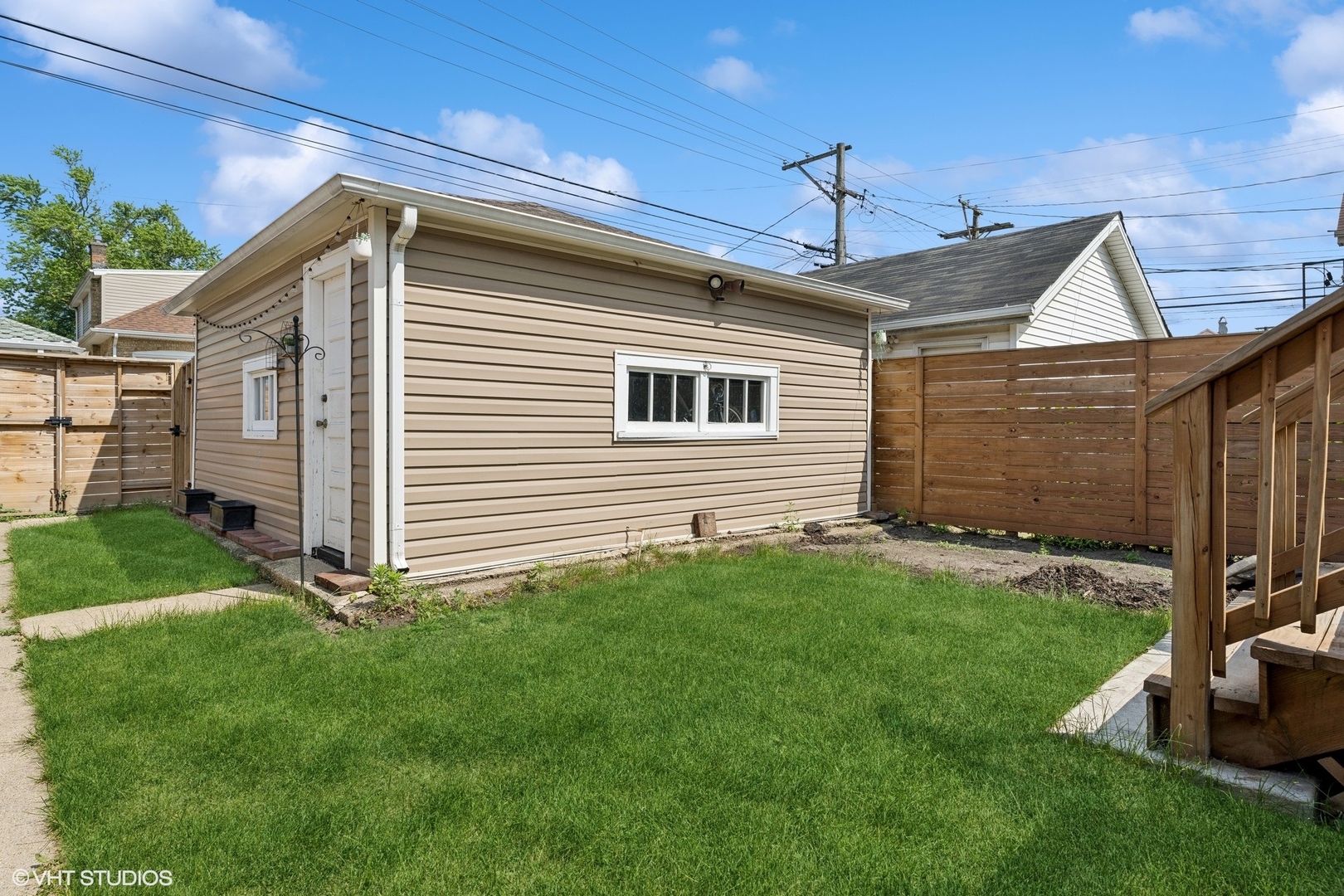 2819 North Rutherford Avenue Chicago, IL 60634 - Photo 27 of 28 a front view of a house with garden