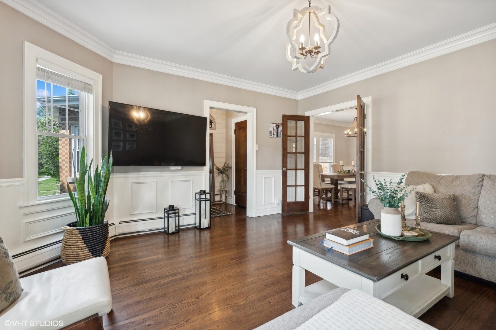 2819 North Rutherford Avenue Chicago, IL 60634 - Photo 5 of 28 a living room with furniture a flat screen tv and wooden floor