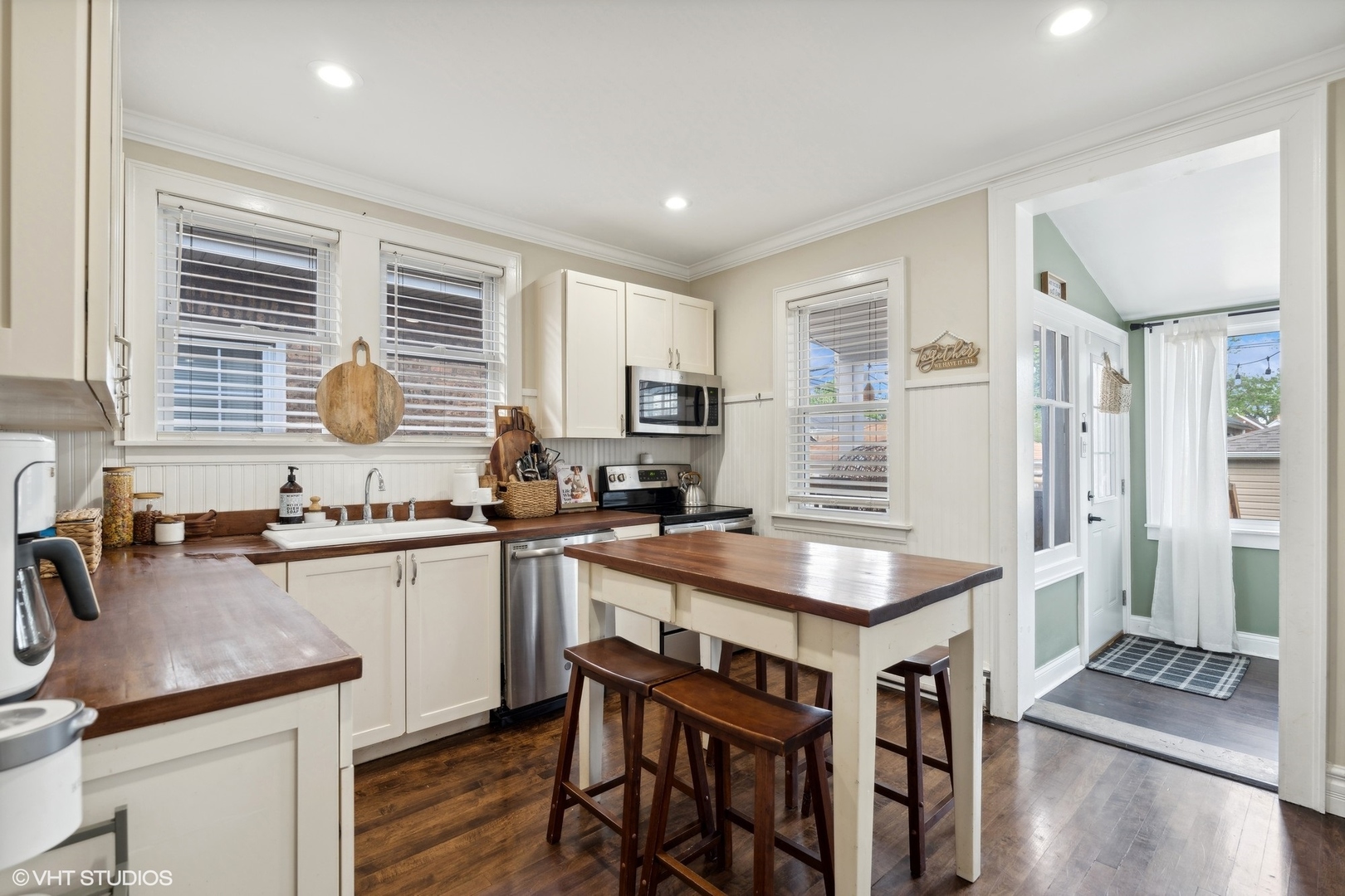 2819 North Rutherford Avenue Chicago, IL 60634 - Photo 6 of 28 a kitchen with granite countertop a sink a counter space and stainless steel appliances