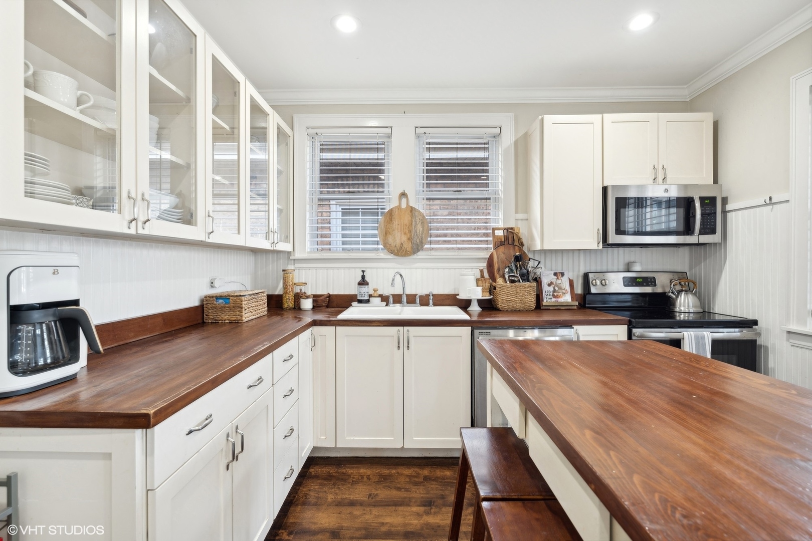 2819 North Rutherford Avenue Chicago, IL 60634 - Photo 7 of 28 a kitchen with stainless steel appliances granite countertop a sink a stove and cabinets