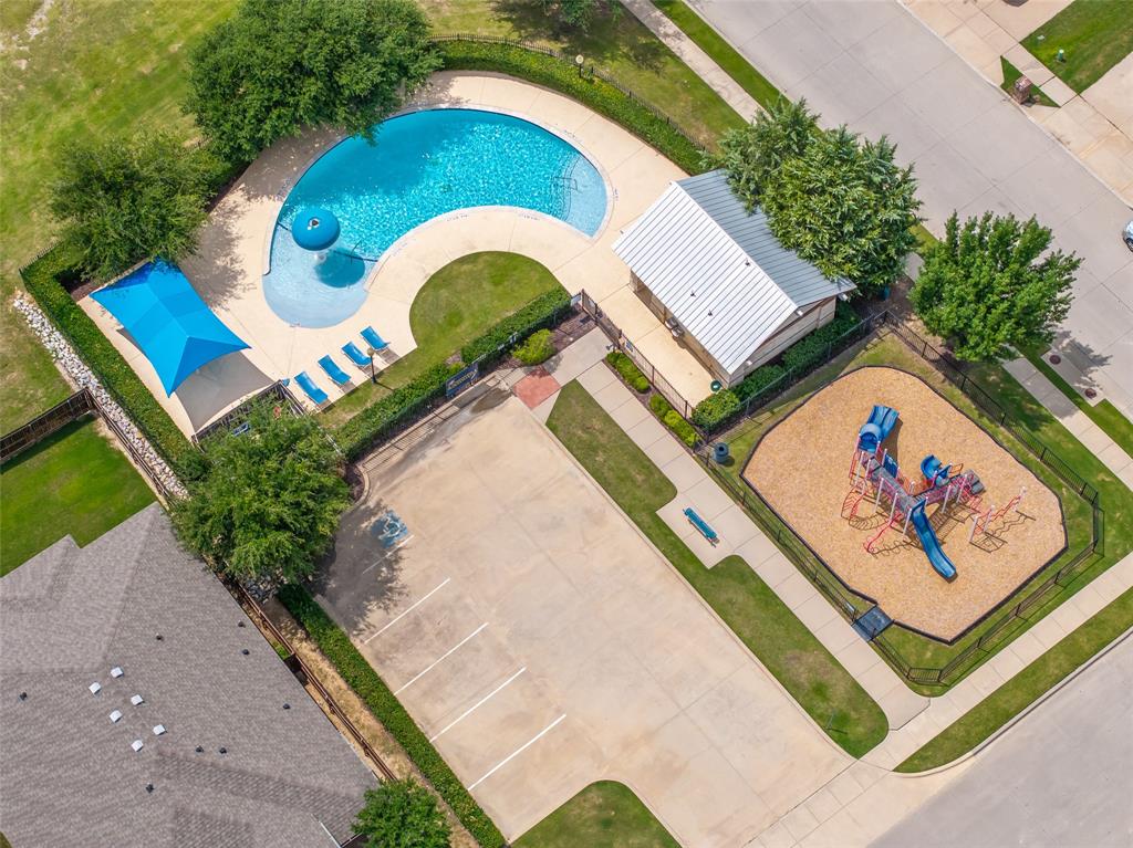 4016 Lazy River Ranch Road Fort Worth, TX 76262 - Photo 37 of 40 Community pool and playground at the end of the street
