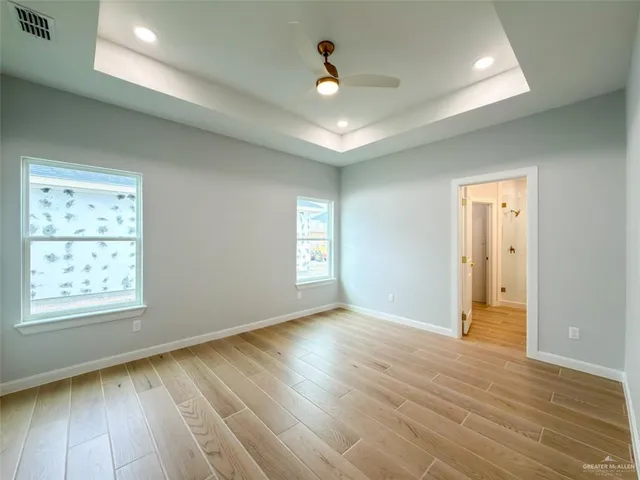 a bathroom with a sink a mirror and a shower