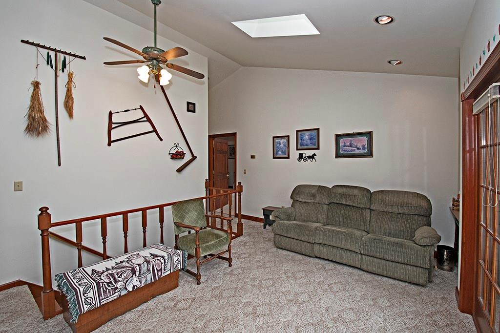 224 Kilgallen Road Butler, PA 16002 - Photo 10 of 25 a living room with furniture and a flat screen tv