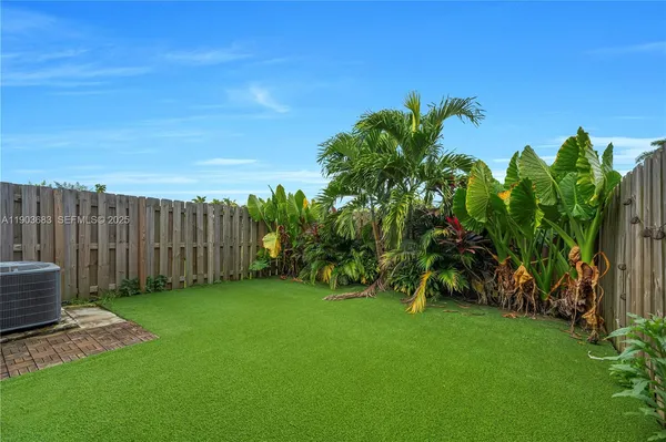a view of a backyard with a garden
