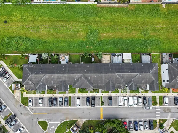 a view of house with a swimming pool