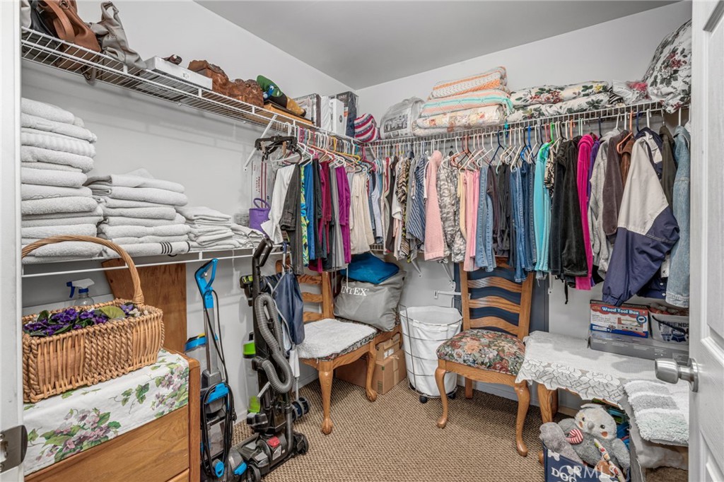 9212 Beverly Road Pico Rivera, CA 90660 - Photo 15 of 43 a view of walk in closet with clothes