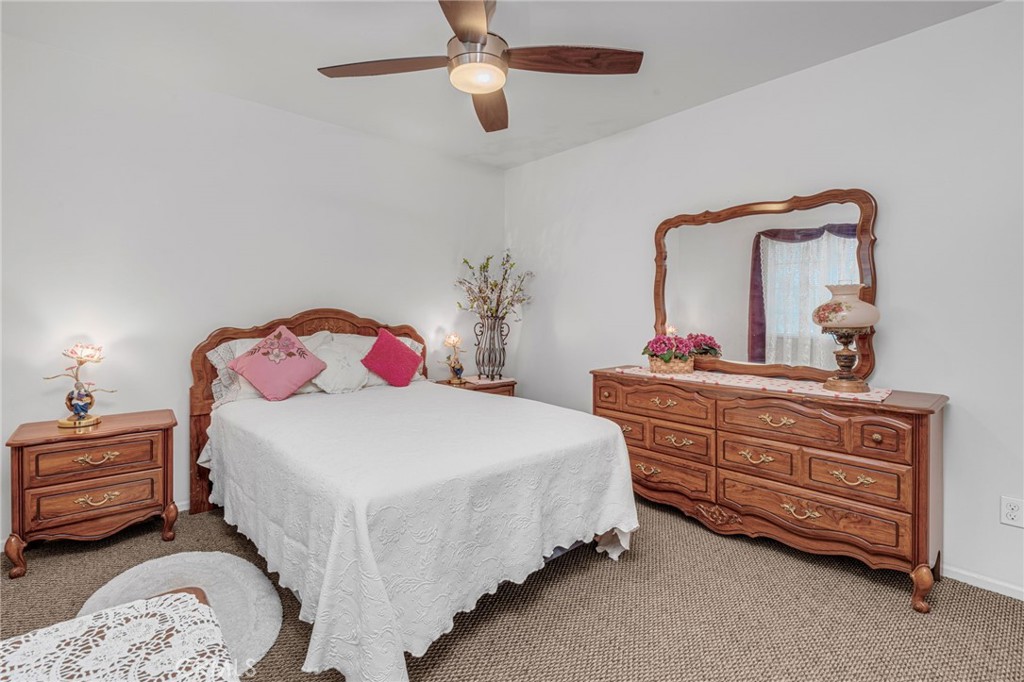 9212 Beverly Road Pico Rivera, CA 90660 - Photo 19 of 43 a bedroom with a bed and a dresser