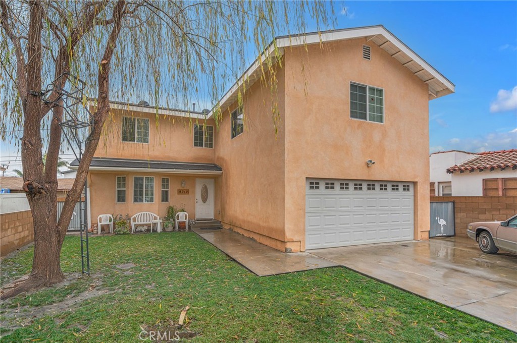 9212 Beverly Road Pico Rivera, CA 90660 - Photo 2 of 43 a view of a house with a yard