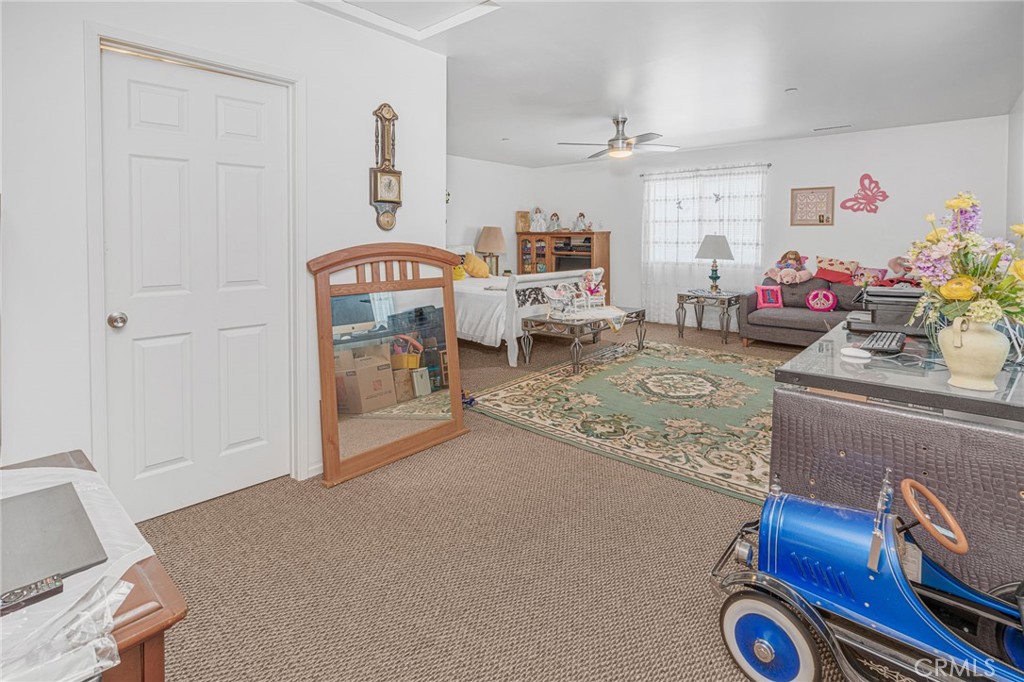 9212 Beverly Road Pico Rivera, CA 90660 - Photo 21 of 43 a living room with furniture and a couch