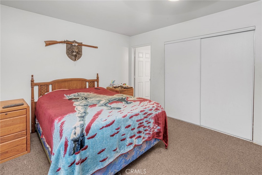 9212 Beverly Road Pico Rivera, CA 90660 - Photo 32 of 43 a bedroom with a bed and a window