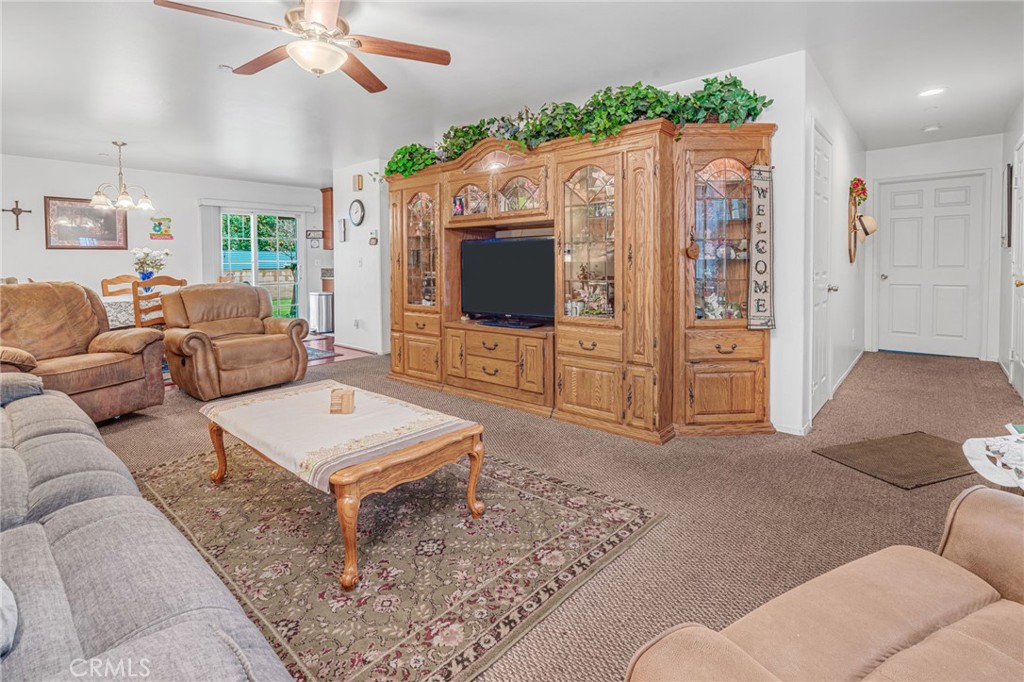9212 Beverly Road Pico Rivera, CA 90660 - Photo 37 of 43 a living room with furniture and a flat screen tv
