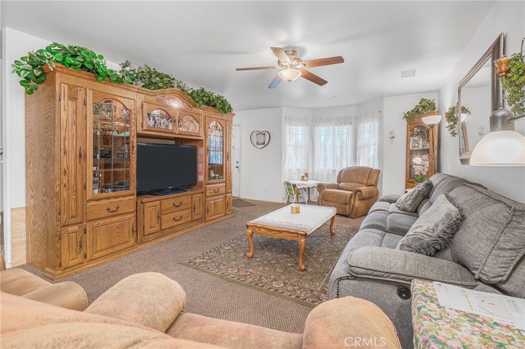 9212 Beverly Road Pico Rivera, CA 90660 - Photo 38 of 43 a living room with furniture and a flat screen tv