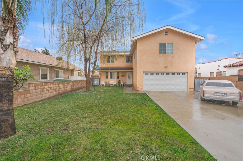 9212 Beverly Road Pico Rivera, CA 90660 - Photo 4 of 43 a view of a house with a yard