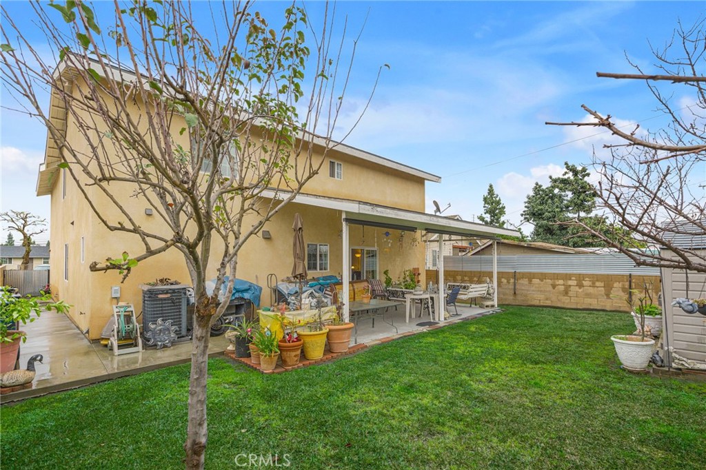 9212 Beverly Road Pico Rivera, CA 90660 - Photo 42 of 43 a view of a house with a yard porch and sitting area