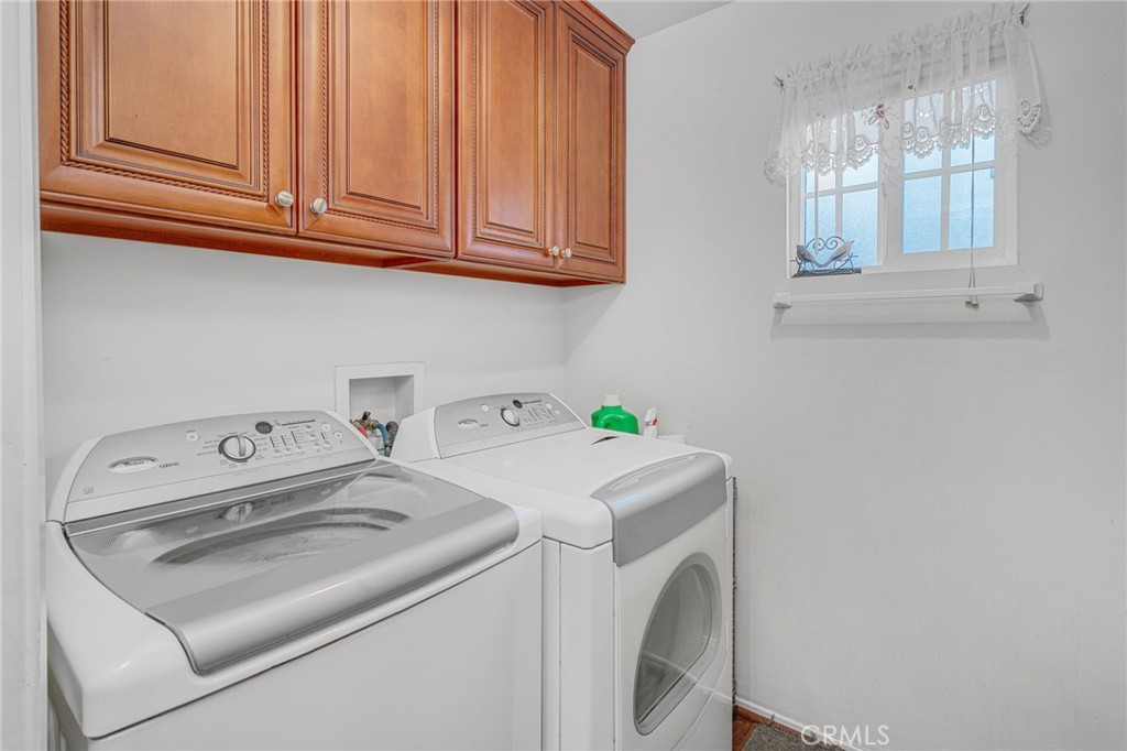 9212 Beverly Road Pico Rivera, CA 90660 - Photo 9 of 43 a utility room with dryer and washer