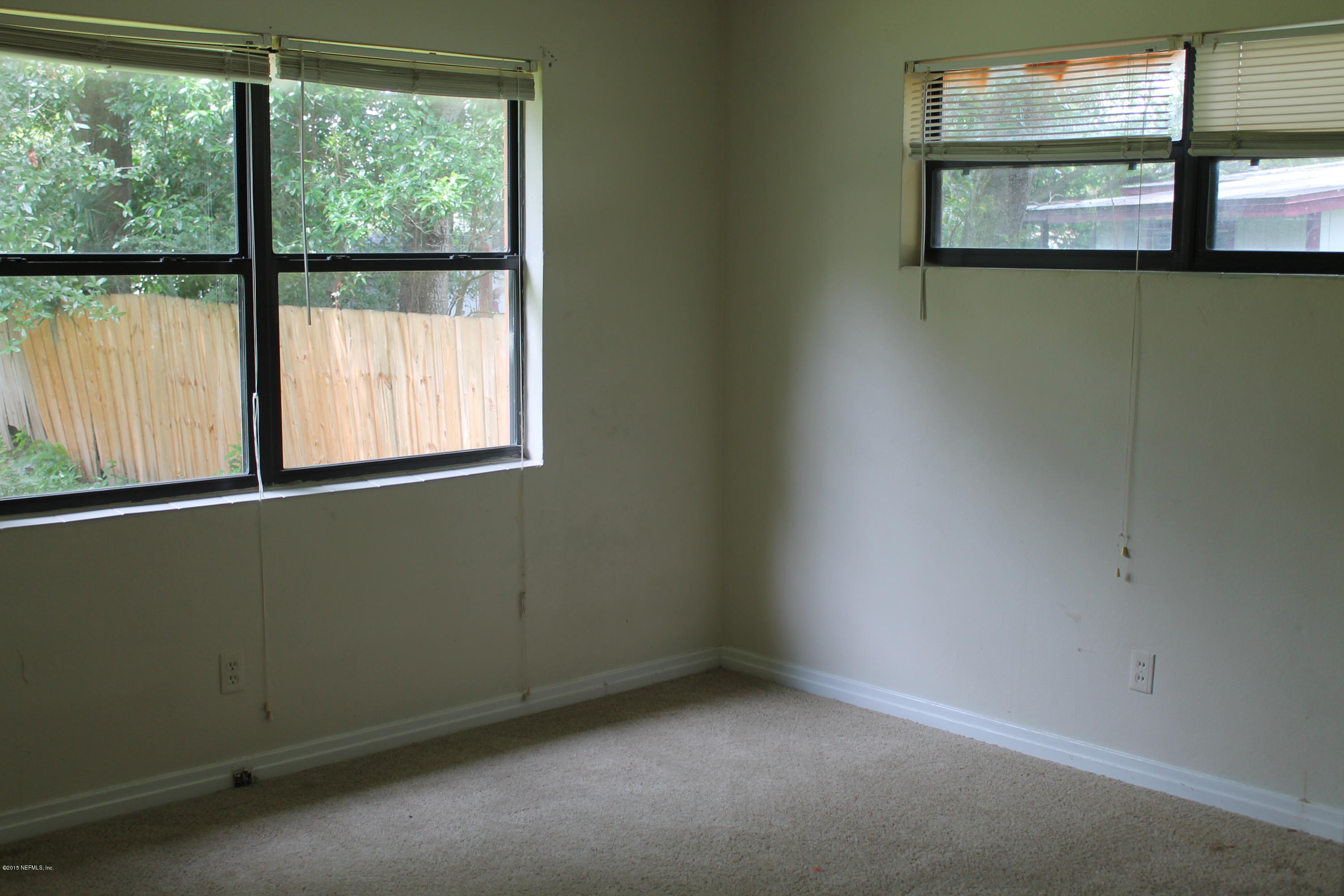 2712 Lorna Road Jacksonville, FL 32211 - Photo 14 of 30 an empty room with a window
