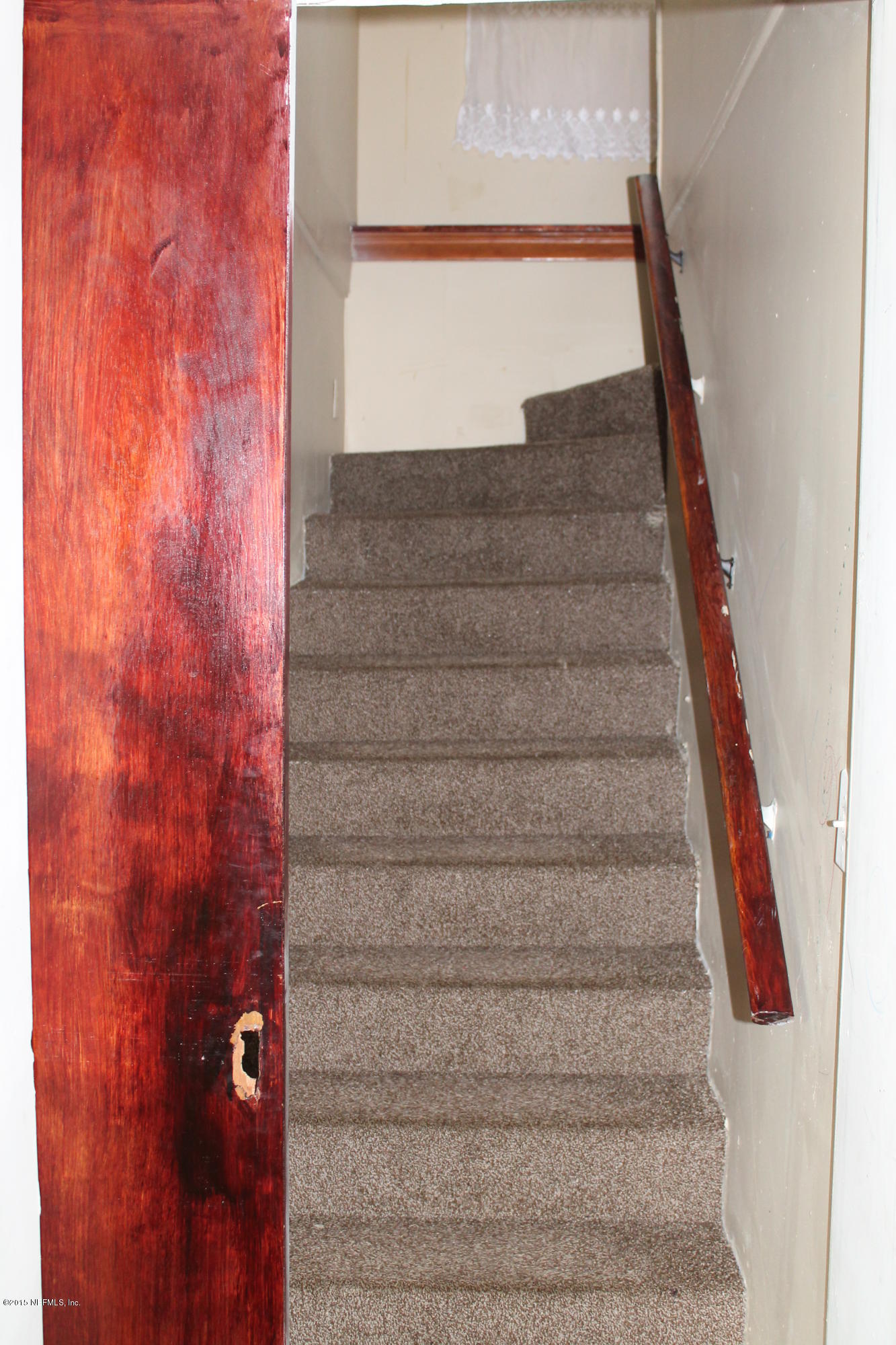 2712 Lorna Road Jacksonville, FL 32211 - Photo 18 of 30 a view of staircase with white walls