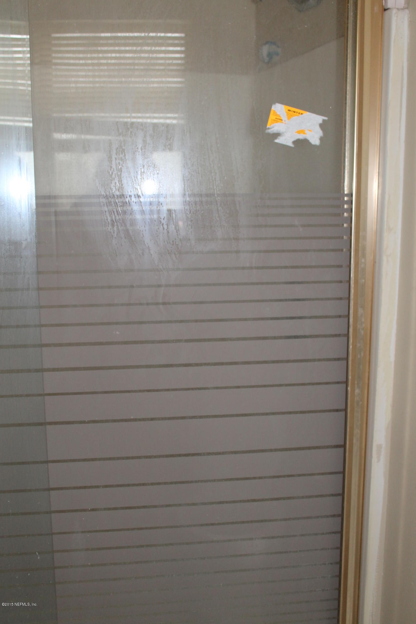 2712 Lorna Road Jacksonville, FL 32211 - Photo 26 of 30 a bathroom with a shower