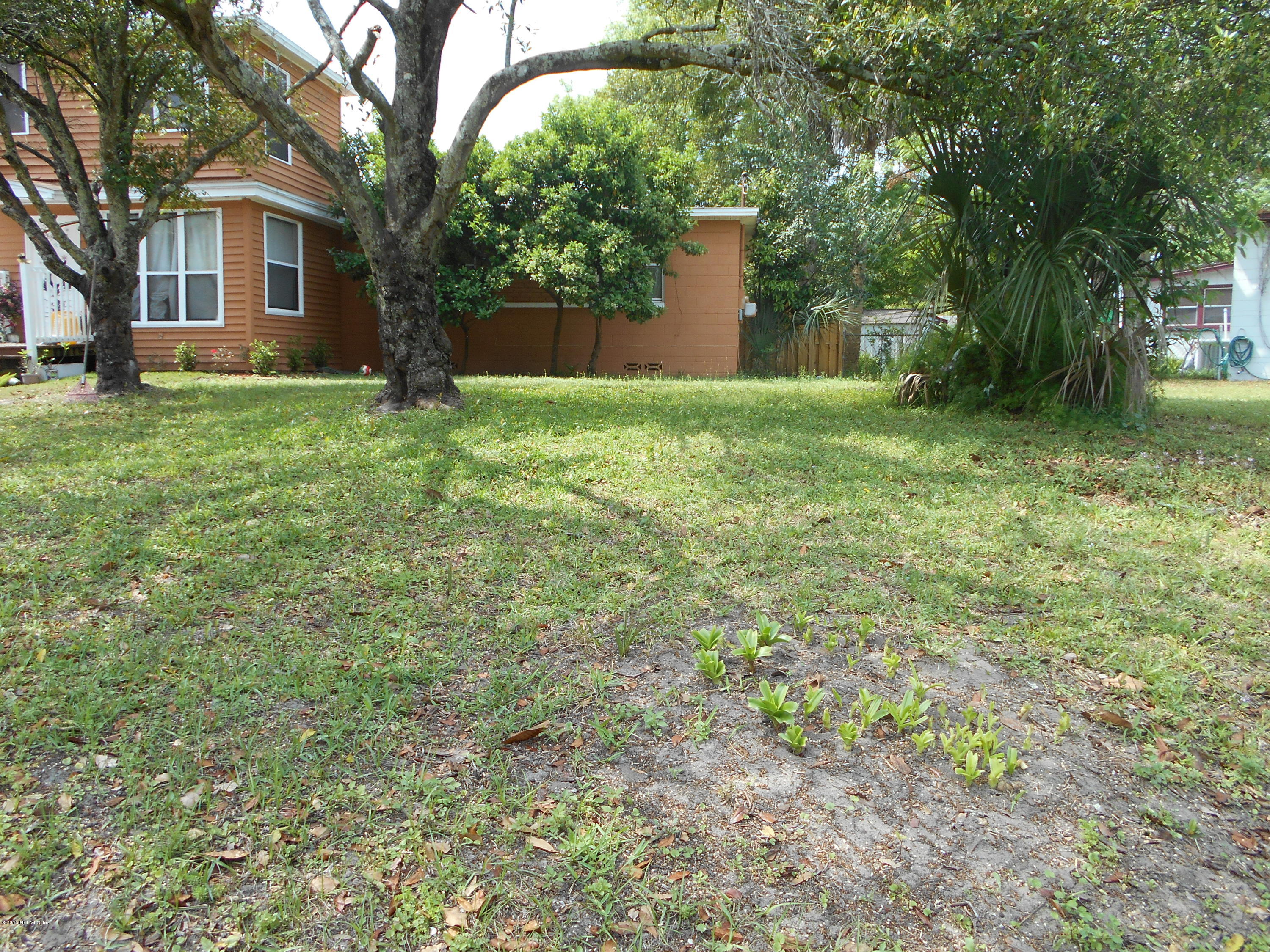 2712 Lorna Road Jacksonville, FL 32211 - Photo 30 of 30 a view of a house with a yard