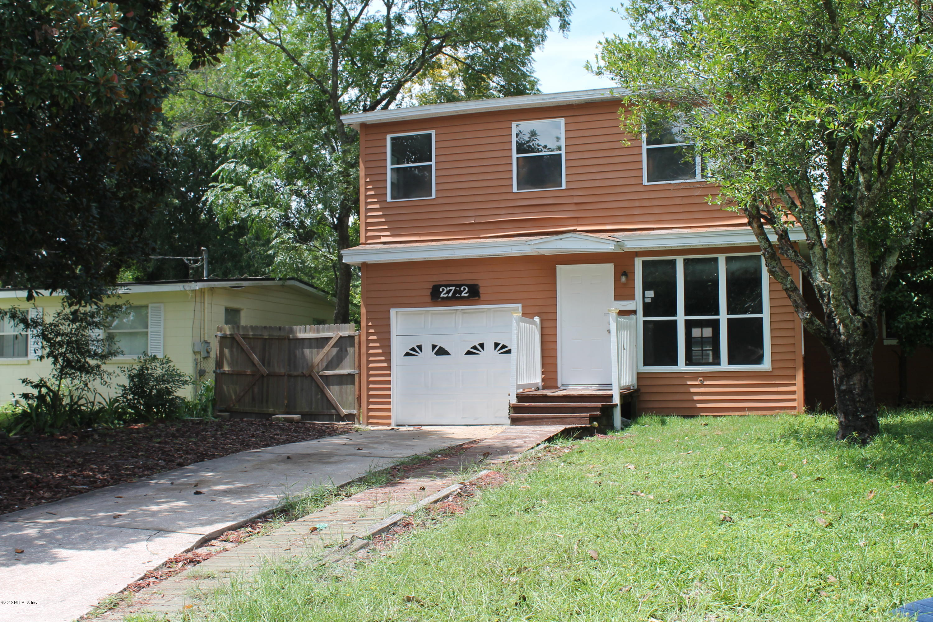 2712 Lorna Road Jacksonville, FL 32211 - Photo 3 of 30 a front view of a house with a yard