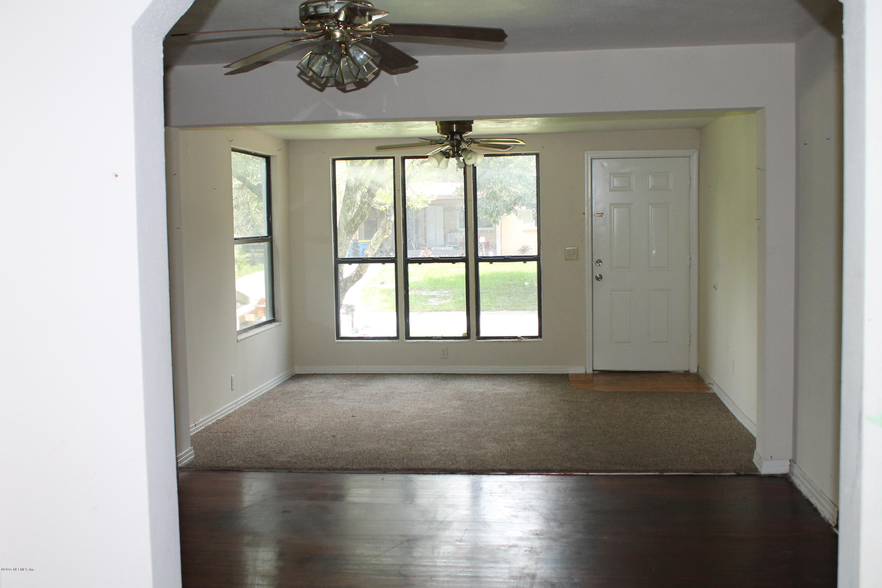 2712 Lorna Road Jacksonville, FL 32211 - Photo 4 of 30 a view of an empty room with a window